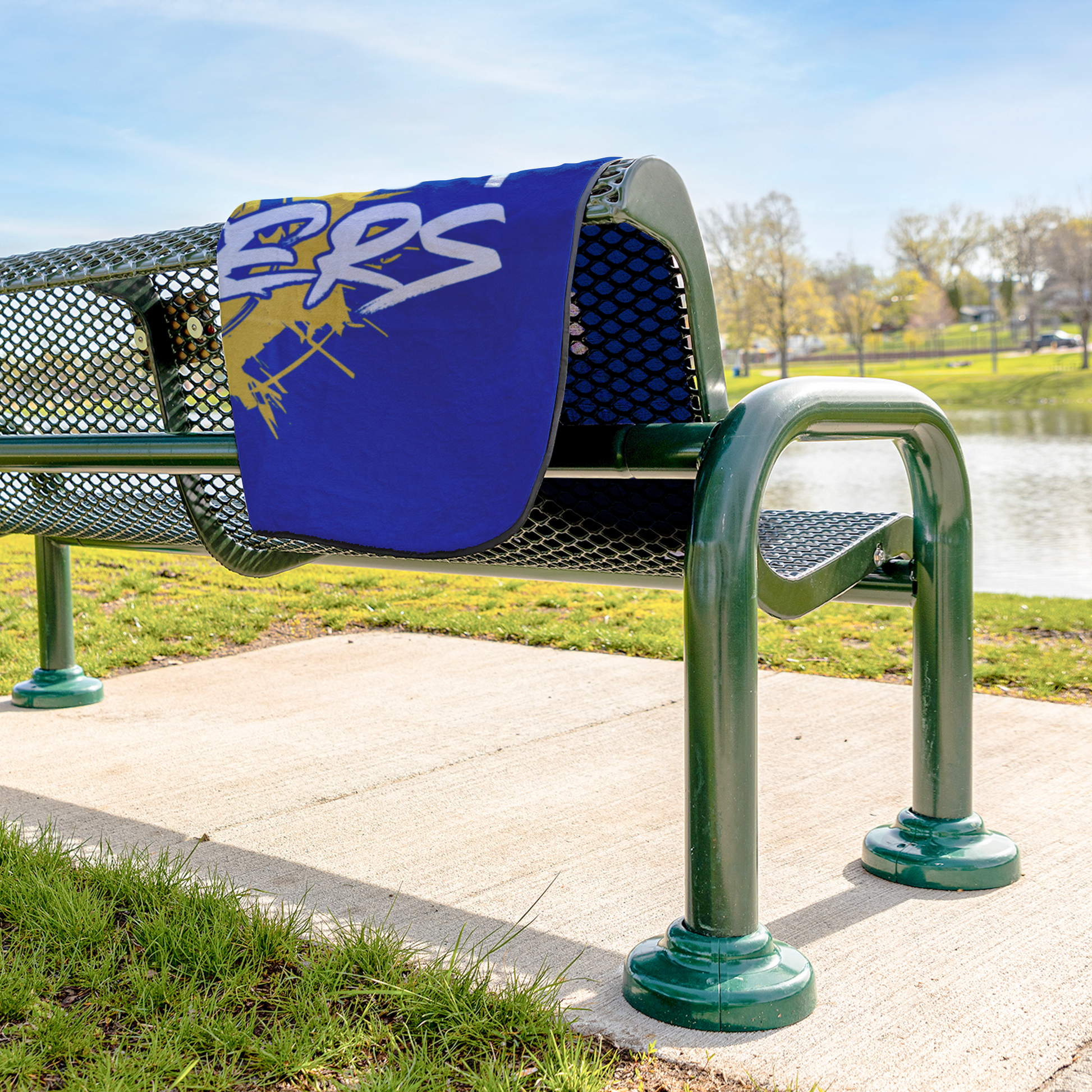 Key_West_Strikers_Stadium_Blanket_StadiumBlanket_Lifestyle_Bench_H_AS_Mockup.png